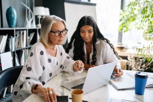women looking at the laptop