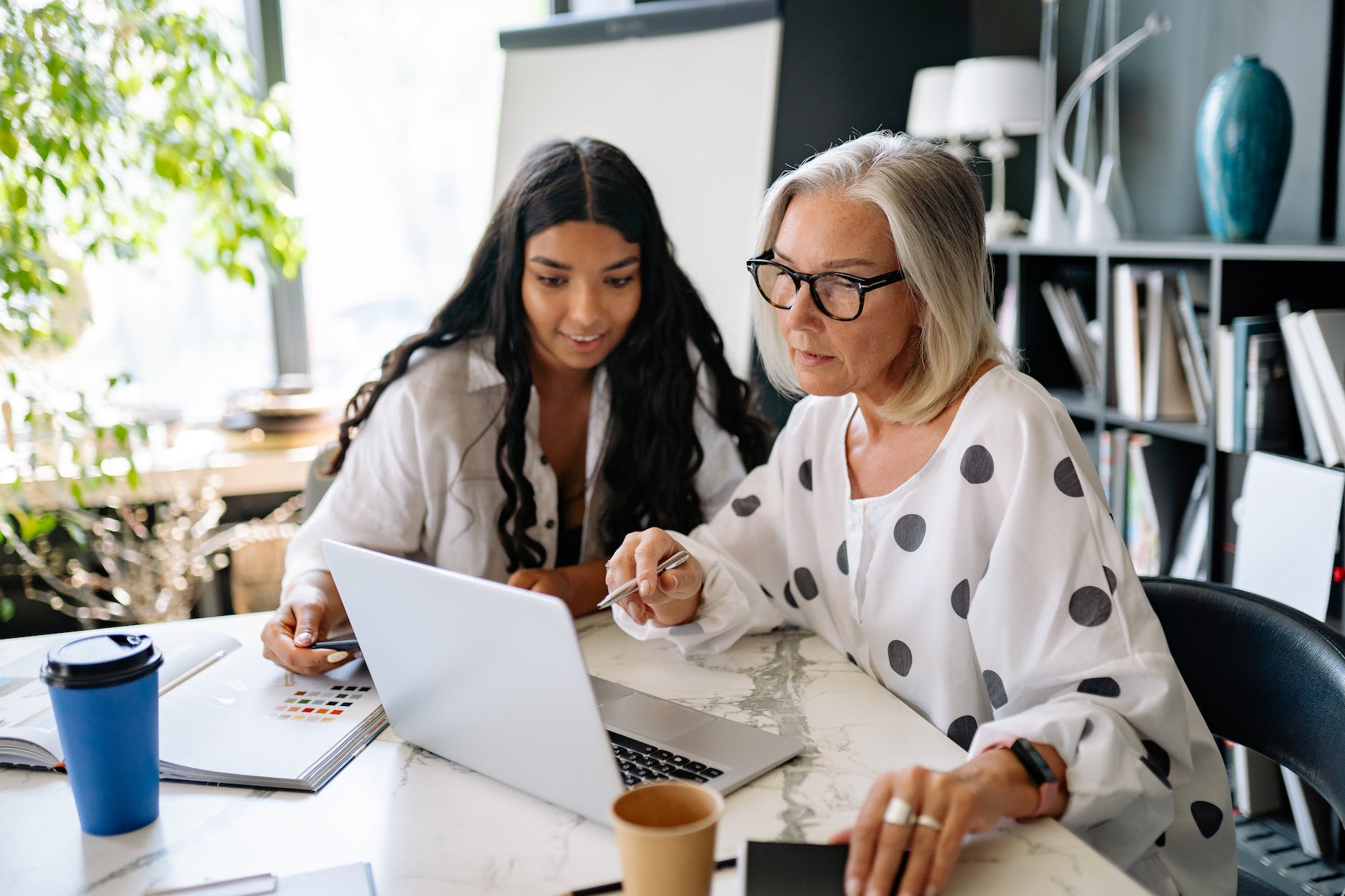 women looking at the laptop